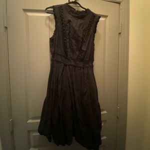 Flattering Torrid black dress with back cut-out